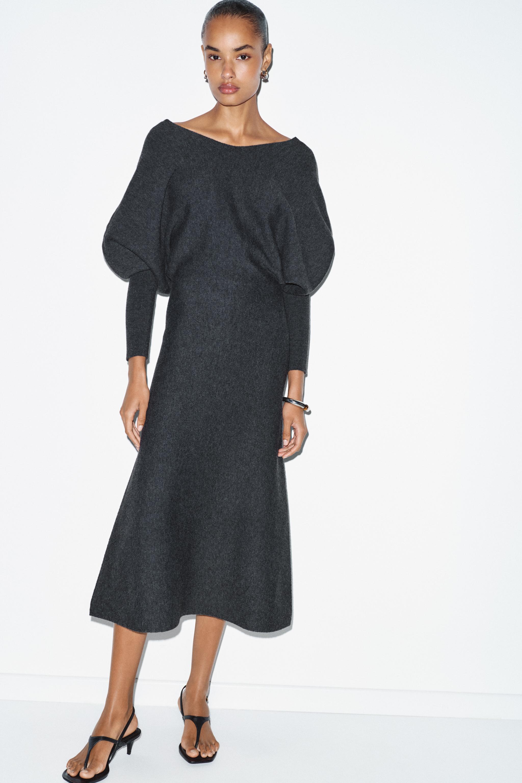 ROBE MI-LONGUE EN MAILLE COL V